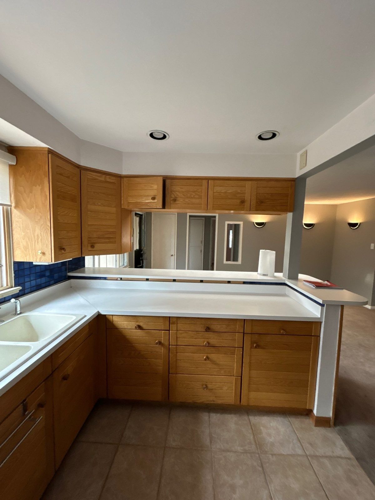 Before: oak cabinets, laminate counters and drop-in sink, Denver kitchen