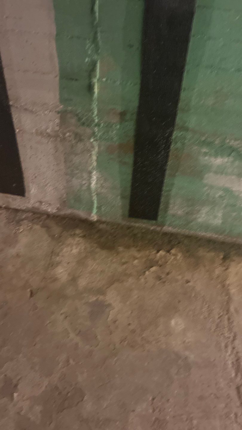 During: carbon-fiber stitching straps installed across foundation wall cracks, Fort Morgan