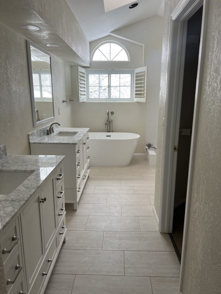 Highlands Ranch bathroom remodel with freestanding tub and tile floor by Brimie Contractors