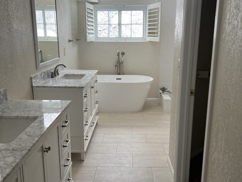 Highlands Ranch bathroom remodel with freestanding tub and tile floor by Brimie Contractors