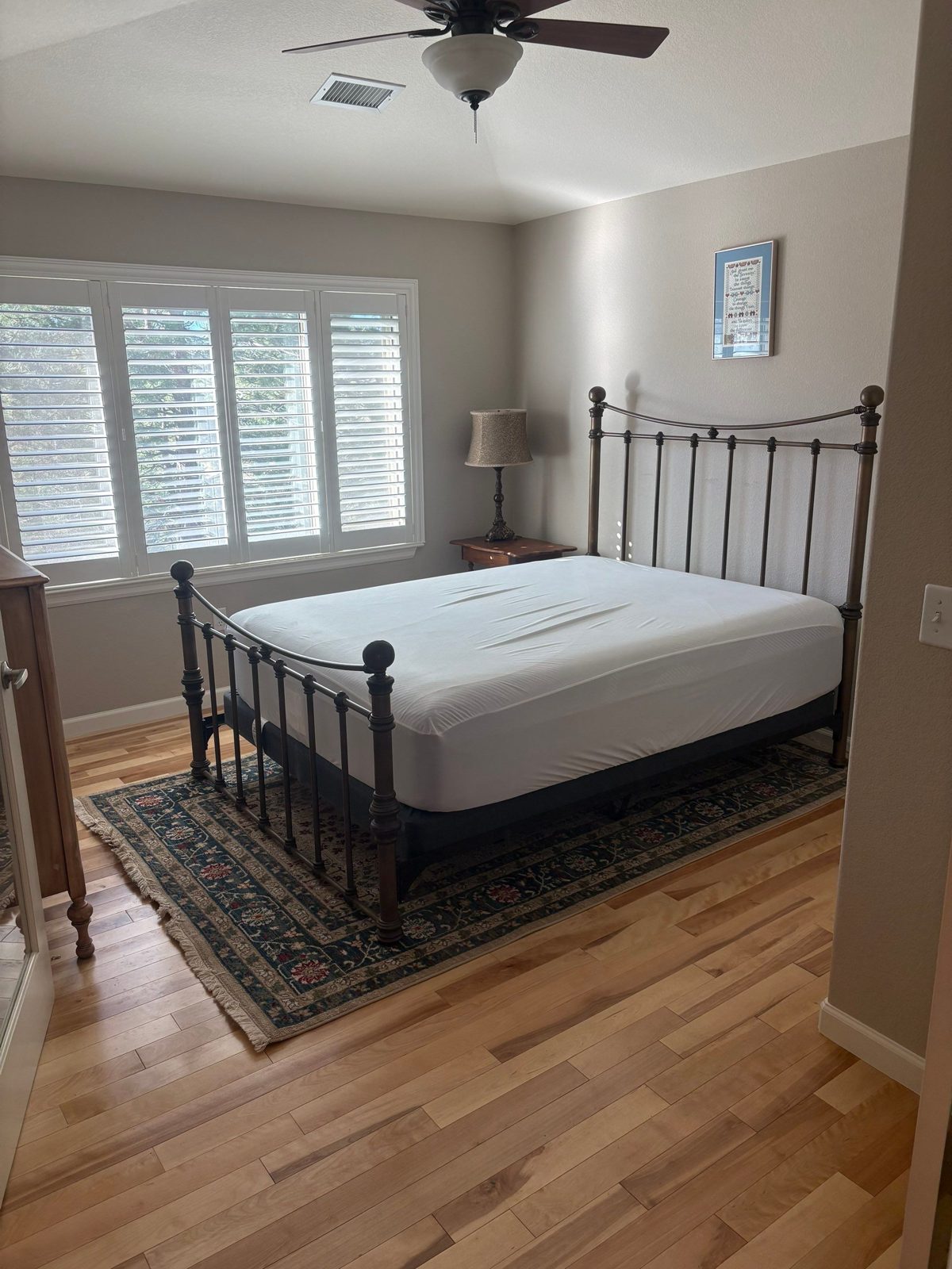 After: new natural hardwood floor in the guest bedroom, Highlands Ranch