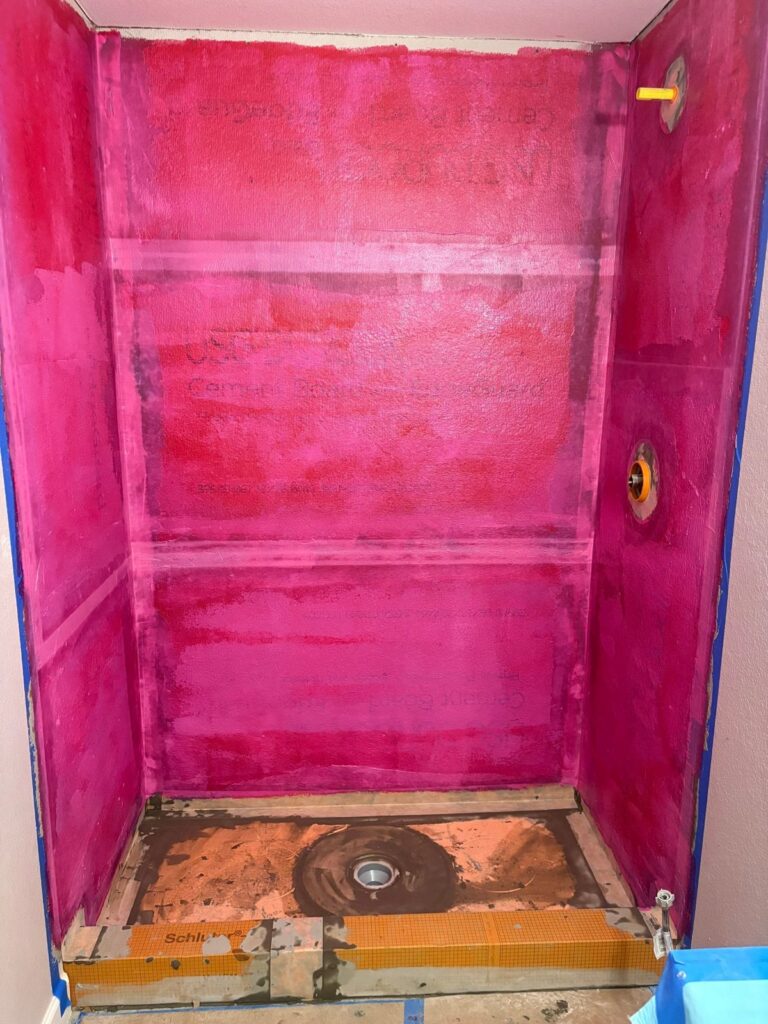 Highlands Ranch shower waterproofing: cement board walls with liquid membrane and a sloped shower pan