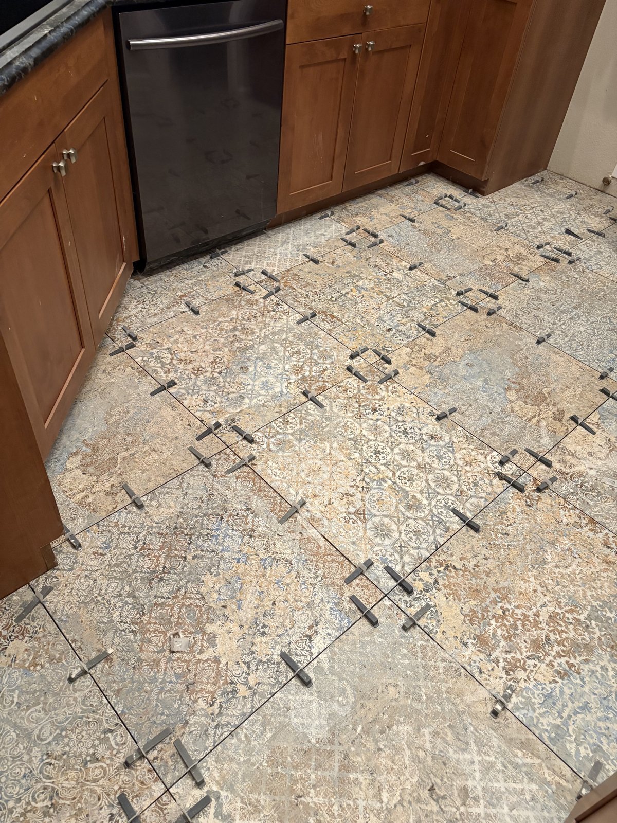 Large-format patterned kitchen tile set with a leveling system, Highlands Ranch
