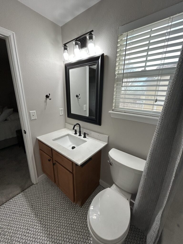 Parker bathroom vanity with new quartz top, undermount sink and matte black faucet