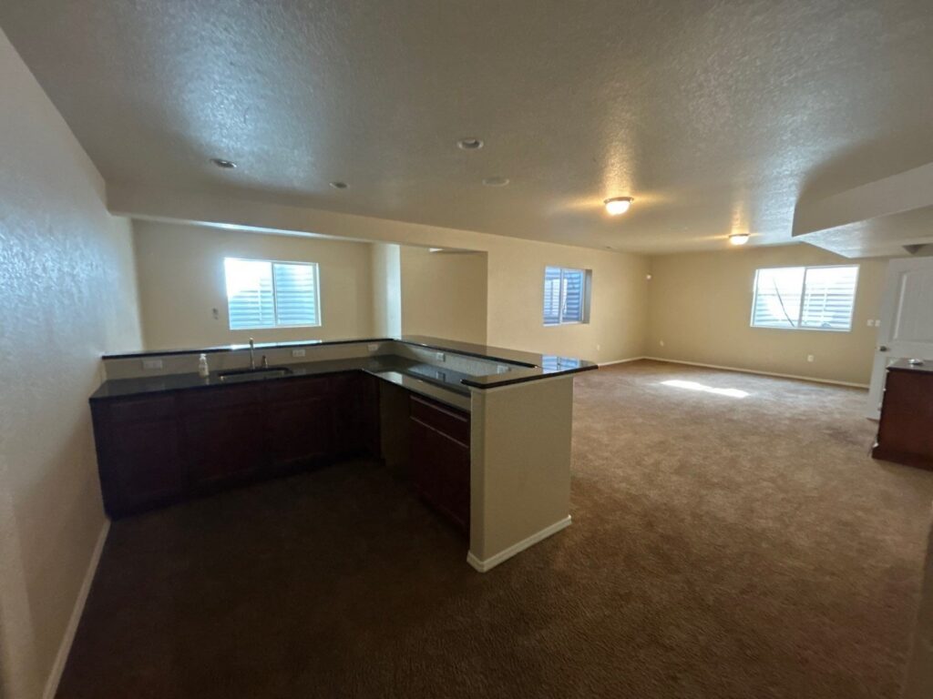 Before: basement kitchenette and family room
